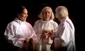 Kate Lawson during her ordination as a priest with Tanya Hockley and Beverley Miles at All Saints Church in Hove 