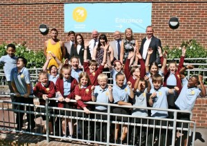 City Academy Whitehawk pupils celebrate being rated good by Ofsted with parent Dave Bailey, chair of governors Stephen Dawson, parent Nicola-Jayne Coonan, head David Williams, parent Tiffany Lawrence, council leader Warren Morgan, City College assistant principal Rebecca Conroy and Fonthill Foundation chairman Andrew Goodall