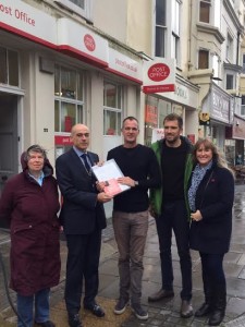 Brunswick resident and post office campaigner Sheila Levenson, Post Office crown area manager for the south east John Taylor, Hove MP Peter Kyle, Councillor Ollie Sykes and City Books owner Inge Sweetman at the handover of the petition to save the Brunswick Town Post Office