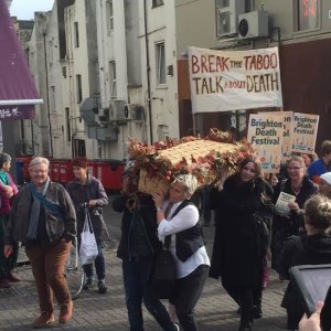 A coffin was carried through the streets as part of the Brighton Death Festival