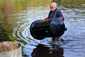 A volunteer retrieves the bins last weekend