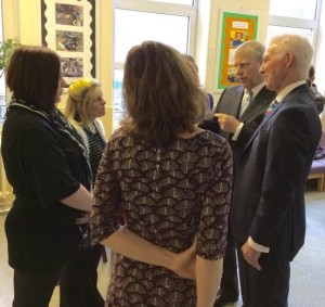 Prince Andrew speaks with City Academy Whitehawk parents Cassandra Scaife, left, and Kelly Pattinson as head teacher David Williams listens