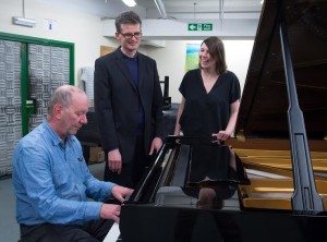 Martin Butler, Ed Hughes and Laura McDermott with Sussex University's new Steinway piano