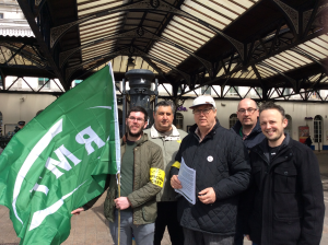 Train guards on strike outside Brighton Station in April