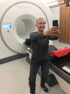 Sara Cutting takes a selfie with one of the new tomotherapy machines