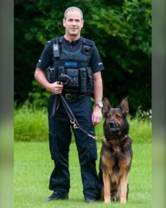 Sergeant Gareth Jackson with Sparky