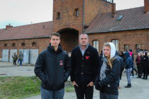 Peter Kyle with Cardinal Newman students Joe McDermott and Matty Whyte at Auschwitz